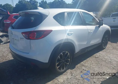 2016 Mazda Cx-5 Grand Touring z USA, uszkodzony, nr VIN JM3KE4DY8G0878617